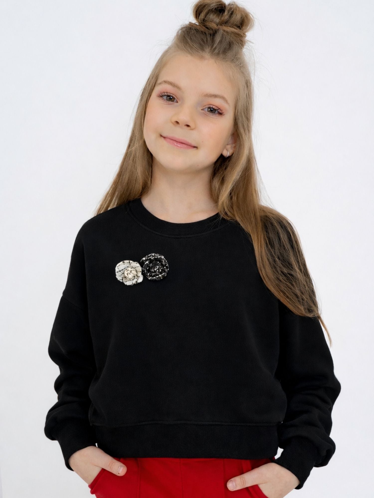 Black Knit Sweatshirt with Decorative Rose Brooches